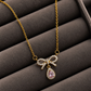 🎀 Rosé Bow Necklace